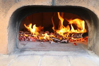 para calentar el horno para una fiesta de pizzas