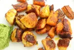 Zanahorias y nabos picantes asados con queso parmesano