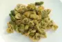 Espárragos verdes y pasta, cocidos juntos y ligados con una salsa de pesto.